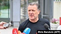 Zdravko Mamic, former head of the Dinamo Zagreb soccer club, addressing reporters as he leaves a Sarajevo court building following his June 15 extradition hearing. 