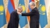 Kazakhstan - Kazakh President Kassym-Jomart Tokayev gives Armenian Prime Minister Nikol Pashinian a state award, Astana, November 21, 2025.
