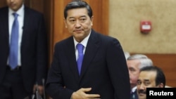 Қазақстан президенті Нұрсұлтан Назарбаевтың парламент сессиясында Серік Ахметовті премьерлікке ұсынған сәті. Астана, 24 қыркүйек 2014 жыл.  