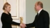 Юлия Тимошенко и Владимир Путин, январь 2009