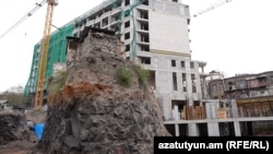 Armenia - A new building is constructed in the center of Yerevan in place of old homes demolished with government permission, April12, 2025.