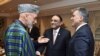 Presidents Hamid Karzai of Afghanistan, Asif Ali Zardari of Pakistan, and Abdullah Gul of Turkey (left to right) chat during a dinner at the Presidential Palace of Cankaya in Ankara.