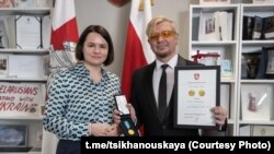 Сьвятлана Ціханоўская і Лявон Вольскі