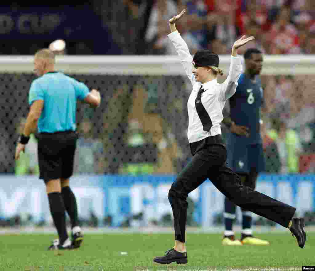 Pussy Riot claimed responsibility for the pitch invasion, tweeting: &quot;Just a few minutes ago four Pussy Riot members performed in the FIFA World Cup final match &mdash; &#39;Policeman enters the Game.&#39;&quot;