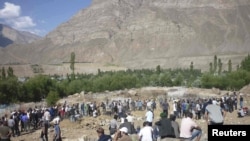 Locals attended the burial of victims of recent fighting in the town of Khorog, the capital of the autonomous region of Gorno-Badakhshan, in July.