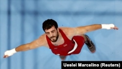 Боксер Ованнес Бачков на соревнованиях в олимпийском Токио