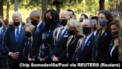 Экс-президент США Билл Клинтон и Хиллари Клинтон, экс-президент США Барак Обама и Мишель Обама, президент США Джо Байден и Джилл Байден, бывший мэр Нью-Йорка Майкл Блумберг на церемонии памяти жертв 11 сентября. Фото: Reuters