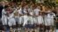 Brazil -- Germany's soccer players celebrate with the World Cup trophy after the 2014 World Cup final between Germany and Argentina at the Maracana stadium in Rio de Janeiro, July 13, 2014