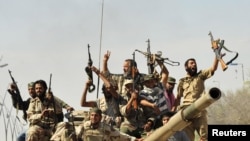 Силы НПС празднуют победу в Сирте