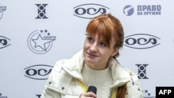 Мария Бутина выступает на пресс-конференции в Москве, октябрь, 2013 год