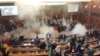 WATCH: Tear Gas Disrupts Kosovo's Parliament