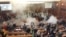 WATCH: Tear Gas Disrupts Kosovo's Parliament