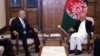 Afghan President Mohammad Ashraf Ghani (right) with Zalmay Khalilzad, the U.S. special representative for Afghan reconciliation (file photo)