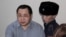 Гражданский активист Ермек Нарымбаев, обвиняемый в возбуждении национальной розни. 