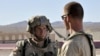 Staff Sgt. Robert Bales (left) is accused of killing 17 people on a shooting rampage on March 11. 