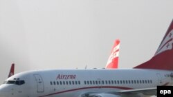 "Грузия аба жолдору" компаниясына таандык Боинг-737 Москвага учууга даярданууда. 8-январь, 2010-жыл.
