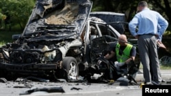 Ուկրաինա - Քննիչներն աշխատում են պայթյունի վայրում, Կիև, 27-ը հունիսի, 2017թ․