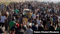 Պաղեստինցիներն օգնություն են ստանում Գազայի մարդասիրական հիմնադրամից, արխիվ