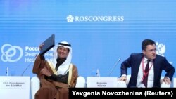 Saudi Energy Minister Abdulaziz Bin Salman and Russian Energy Minister Aleksandr Novak attend an energy forum in Moscow in October 2019.