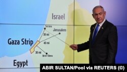 Израилдин премьер-министри Беньямин Нетаньяху Газа тилкесин картадан көрсөтүп жатат, 4-сентябрь, 2024-жыл. 