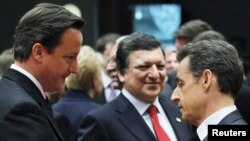 Дэвид Кэмерон и Николя Саркози на саммите Евросоюза в Брюсселе, 11 марта 2011 г 