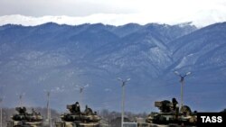 The text directly states that Russian military forces may be used to defend Russian citizens abroad, a point that was not in the 2000 version.