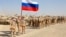 Российские войска перед началом совместных военных учений с Таджикистаном и Узбекистаном к северу от таджикской границы с Афганистаном 10 августа
