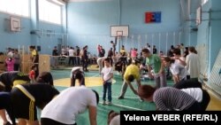 Караганды шаарында өткөн "Аутизмди жеңебиз" деген иш-чарадан тартылган сүрөт. 