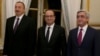 Azerbaijani President İlham Aliyev (left), French President Francois Hollande (center) and Armenian President Serzh Sarkisian in Paris for talks on the Nagorno-Karabakh conflict on October 27. 