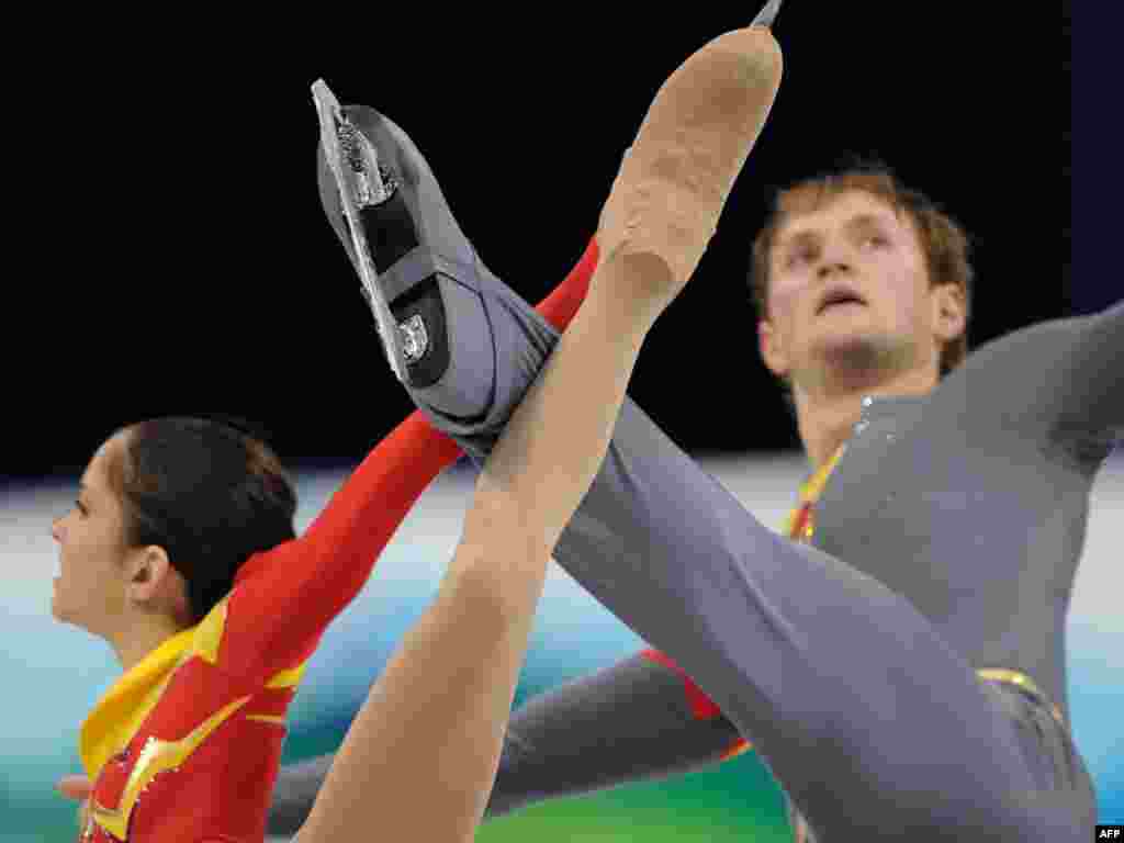 Российские фигуристы Вера Базарова и Юрий Ларионов на Олимпиаде в Ванкувере. В Сочи российские спортсмены получат по 113 тысяч долларов за золото, 71 тысячу за серебро и 42 тысячи долларов - за бронзу.