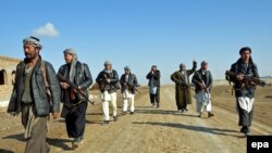 Ýerli owgan polisiýasynyň agzalary, Gunduz, dekabr, 2014. 