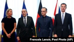 از چپ به راست، فدریکا موگرینی نمایندۀ عالی اتحادیه اروپا در امور خارجی و پالیسی امنیتی، ژان ایو لو دریان وزیر خارجه فرانسه، هایکو ماس وزیر خارجه جرمنی و جرمی هانت وزیر خارجه بریتانیا
