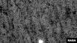 Впервые посадку зонда на Марс снимал другой спутник