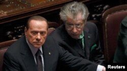 Международные комментаторы называют внутреннюю политику Италии водевилем во многом благодаря скандалам, связанным с премьер-министром страны Сильвио Берлускони (на фото слева)