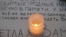 Зажженная свеча в память о жертвах авиакатастрофы А321