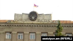 Nagorno-Karabakh - The Karabakh flag flies over the main government building in Stepanakert, 9Jul2011.