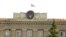 Nagorno-Karabakh - The Karabakh flag flies over the main government building in Stepanakert, 9Jul2011.