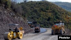 Armenia -- Workers refurbish a road in Syunik region in 2010.