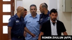 Гонен Сегев (в голубой рубашке)