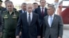 На переднем плане: министр обороны России Сергей Шойгу, президент России Владимир Путин и президент Татарстана Рустам Минниханов во время посещения Казанского авиационного завода имени С. П. Горбунова — филиала ПAO «Туполев». Татарстан, Казань, май 2019 года 
