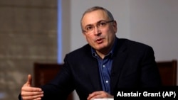 Exiled former Russian oligarch Mikhail Khodorkovsky speaks to the Associated Press during an interview in London on February 15.